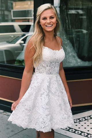 Robe de bal courte en dentelle bleue, bretelles spaghetti, dos croisé, coupe trapèze, référence PD259