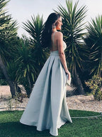 Vestidos de graduación de satén, corte en A, sin mangas, largos hasta el suelo, con tirantes finos y volantes.