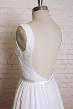 Vestido de novia de corte A con tirantes, cola de corte, apliques de gasa y espalda descubierta WD172