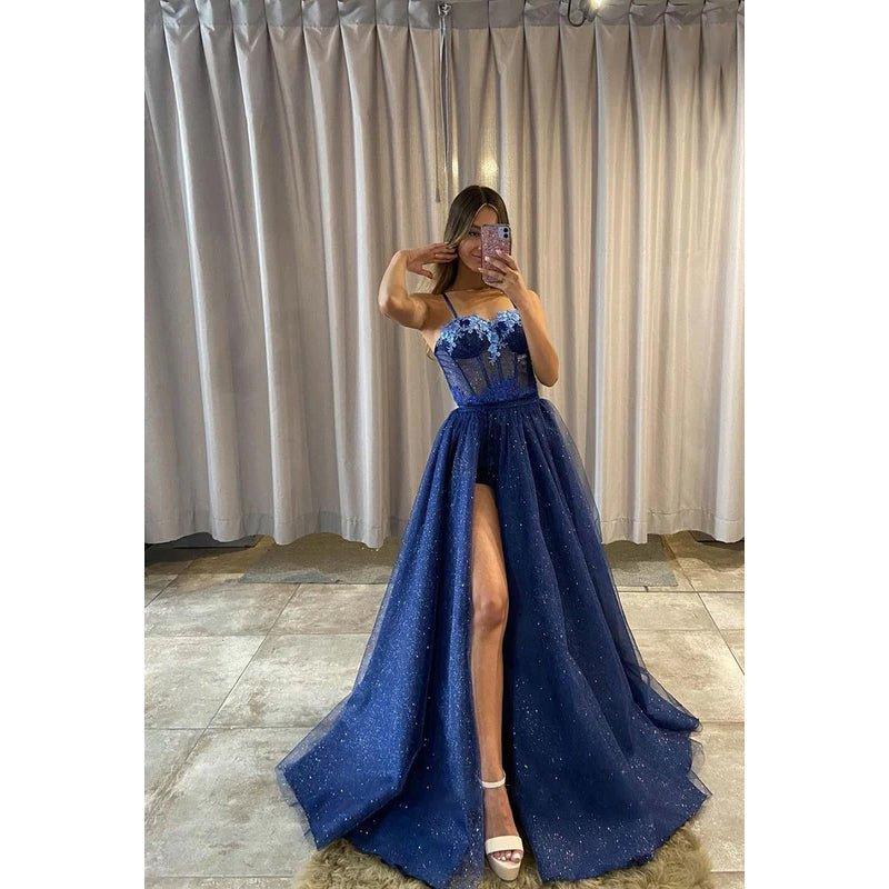 Vestido de fiesta formal sin mangas, de corte en A, con tirantes, apliques de tul y lentejuelas.