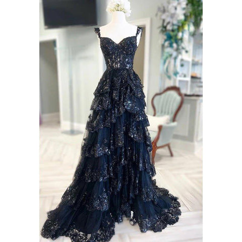 Vestido de fiesta sin mangas con tirantes, tul, apliques y lentejuelas, cierre de cremallera y corte en A