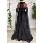 Vestido largo de fiesta negro de tul con escote corazón y estrella, corte en A y brillo.