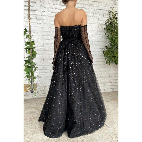 Vestido largo de fiesta negro de tul con escote corazón y estrella, corte en A y brillo.