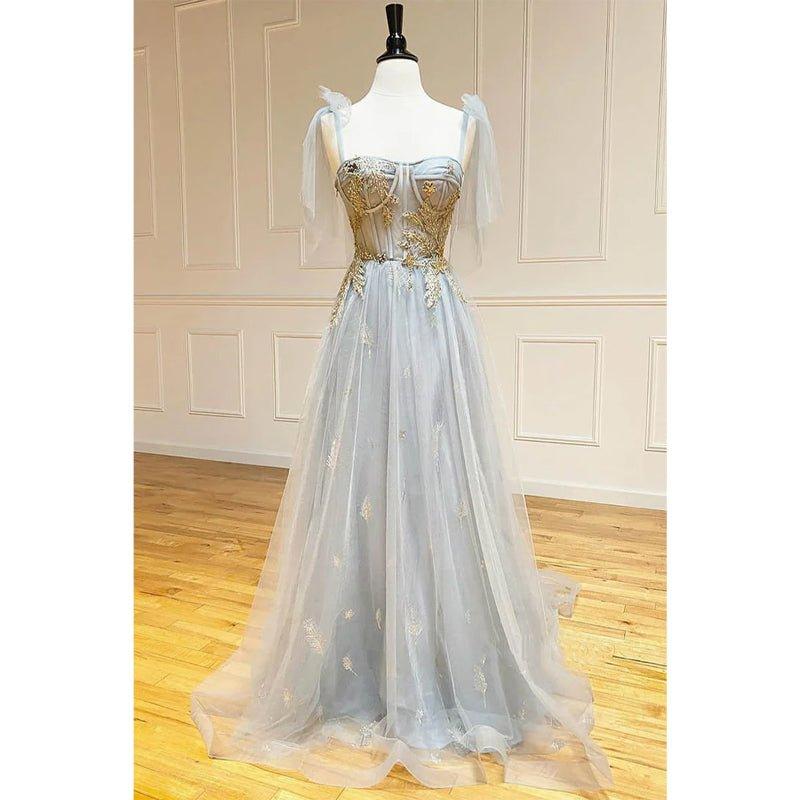 Vestido largo de fiesta corte A con escote corazón y apliques bordados. 