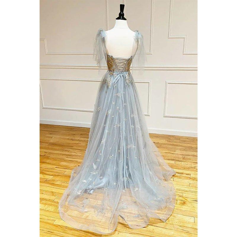 Vestido largo de fiesta corte A con escote corazón y apliques bordados. 