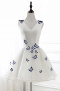 Vestido de fiesta de organza color marfil con escote en V y corte en A con apliques PD138