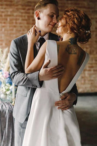 Vestido de novia largo de satén, corte línea A, escote en V, espalda descubierta y bolsillos WD005