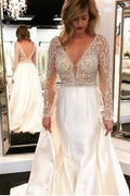 Vestidos de novia de corte A, escote en V, corpiño transparente, mangas largas con cuentas WD454