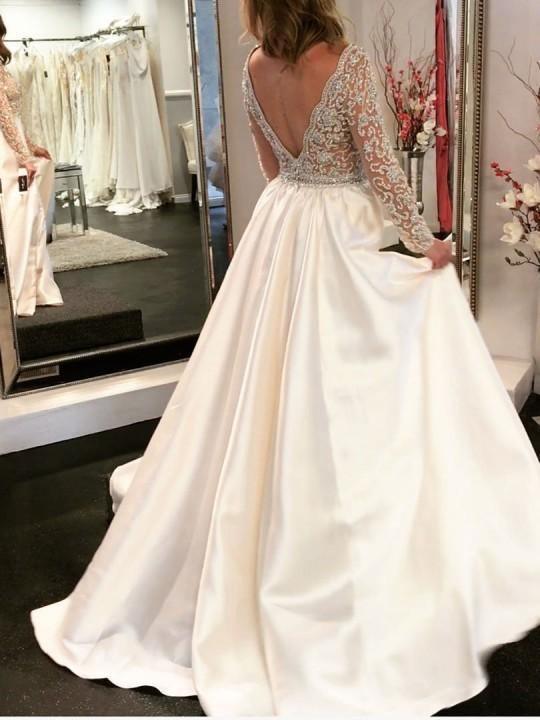 Vestidos de novia de corte A, escote en V, corpiño transparente, mangas largas con cuentas WD454