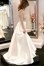 Vestidos de novia de corte A, escote en V, corpiño transparente, mangas largas con cuentas WD454