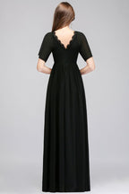 Robe de demoiselle d'honneur longue en mousseline noire, coupe trapèze, col en V, manches courtes, col en V.