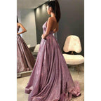 Vestido de fiesta brillante con escote en V, tirantes finos y bolsillos. 