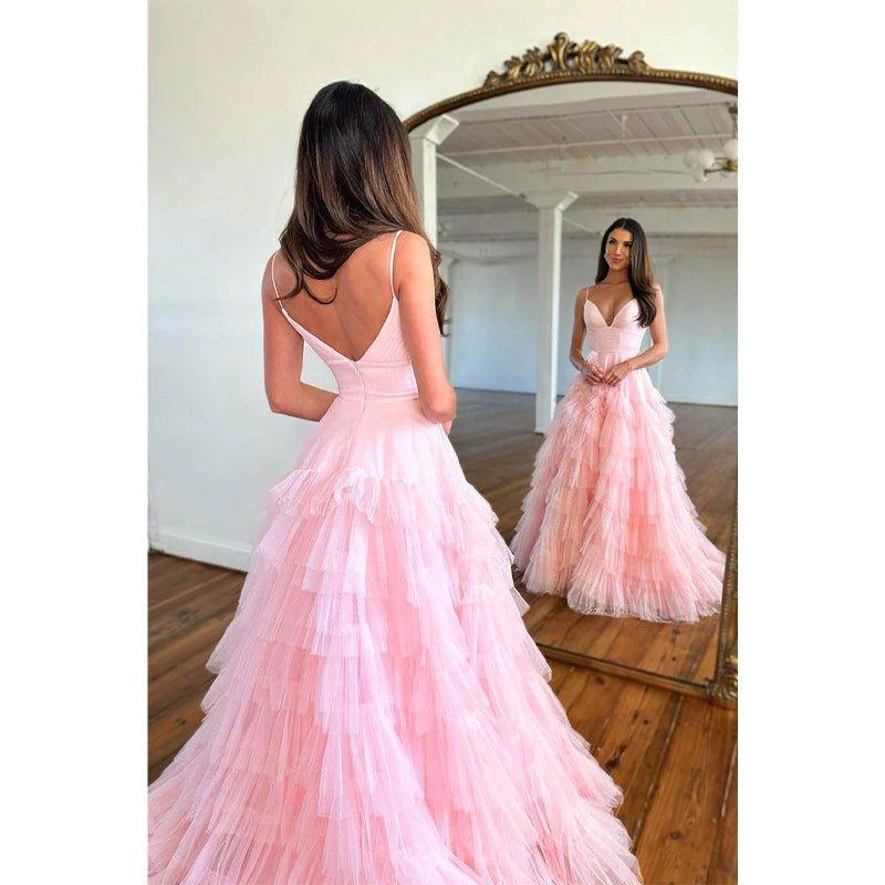 Vestido largo rosa de fiesta de bienvenida con escote en V, corte en A y volantes de tul.