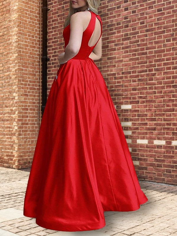 Vestidos de graduación de satén con cuentas, corte línea A/elegante, sin mangas, hasta el suelo y con cuello halter.