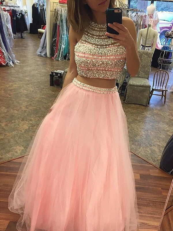 Vestidos de graduación de dos piezas con corte en A, elegantes, sin mangas, de tul, con cuentas y largo hasta el suelo.
