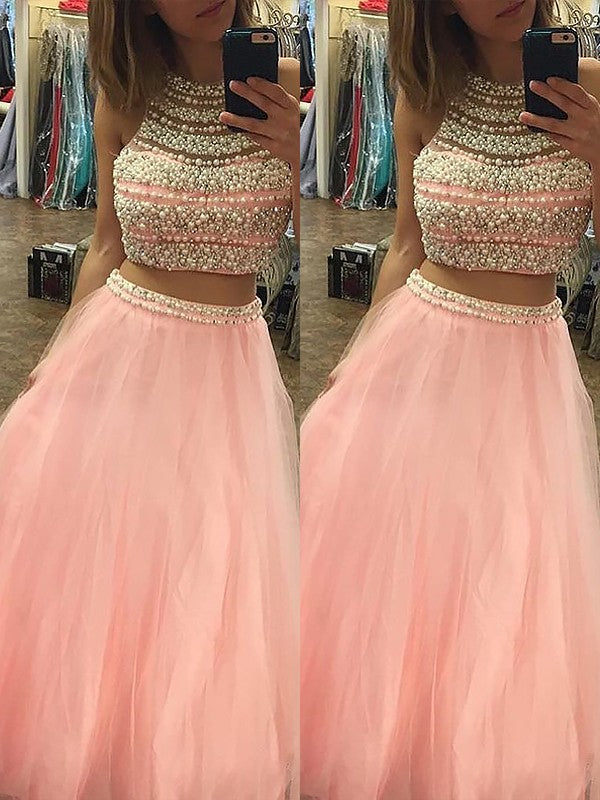 Vestidos de graduación de dos piezas con corte en A, elegantes, sin mangas, de tul, con cuentas y largo hasta el suelo.