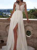 Vestidos de fiesta de gasa con apliques, corte en A/elegantes, manga corta y escote redondo.