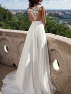 Vestidos de fiesta de gasa con apliques, corte en A/elegantes, manga corta y escote redondo.