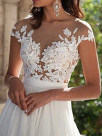 Vestidos de fiesta de gasa con apliques, corte en A/elegantes, manga corta y escote redondo.