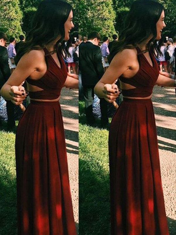 Vestidos de graduación de dos piezas de corte línea A/elegantes, sin mangas, con cuello halter y largo hasta el suelo, de gasa.