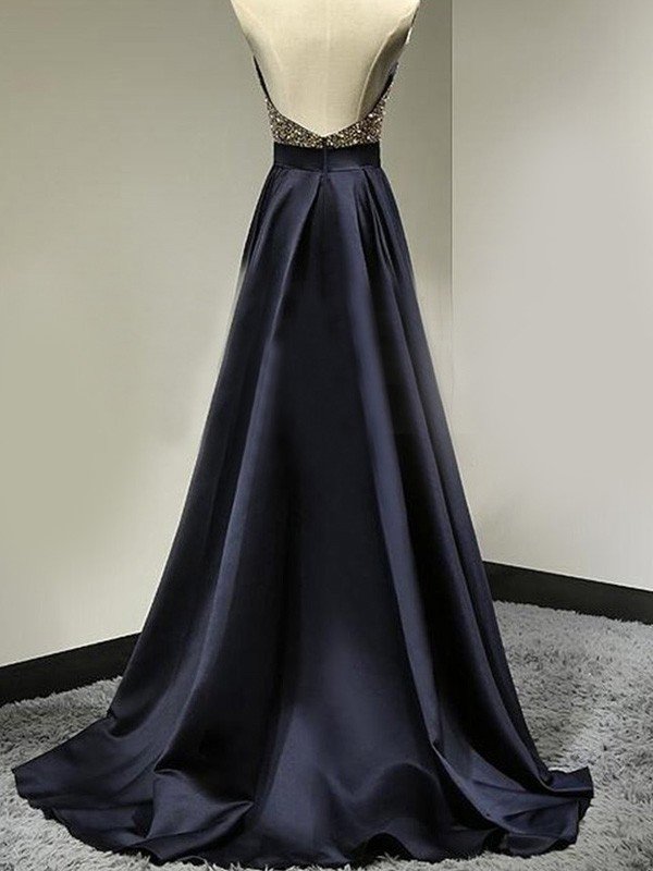Vestidos de graduación elegantes de corte línea A, sin mangas, con cuello halter, de satén y hasta el suelo, con cuentas.