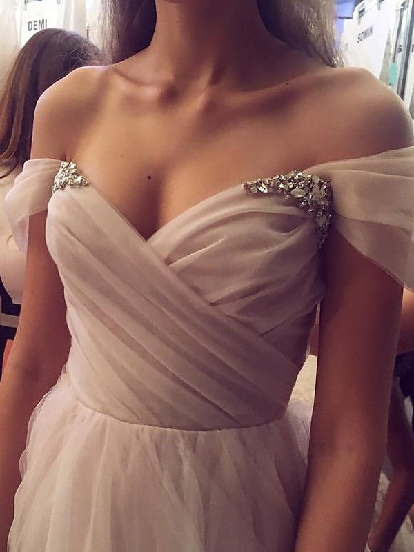 Vestidos de graduación de corte A/elegantes sin mangas con hombros descubiertos, de tul y con cuentas