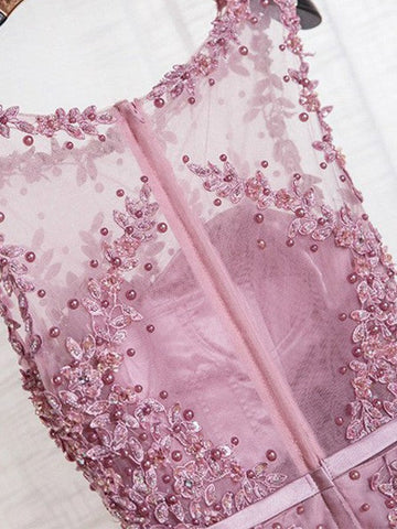 Vestidos de graduación elegantes de corte A, sin mangas, con escote redondo y largo hasta el suelo, de tul con cuentas.