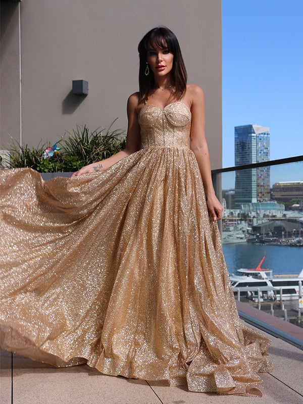 Vestidos de graduación de corte A/elegantes con tirantes finos, lentejuelas, sin mangas y volantes
