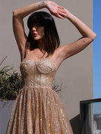 Vestidos de graduación de corte A/elegantes con tirantes finos, lentejuelas, sin mangas y volantes