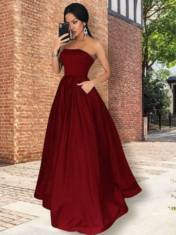 Vestidos de graduación de satén con volantes, corte en A, elegantes, sin tirantes y hasta el suelo