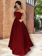 Vestidos de graduación de satén con volantes, corte en A, elegantes, sin tirantes y hasta el suelo