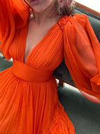Vestidos de graduación de corte A/elegante con escote en V, mangas largas y volantes de gasa 3D.