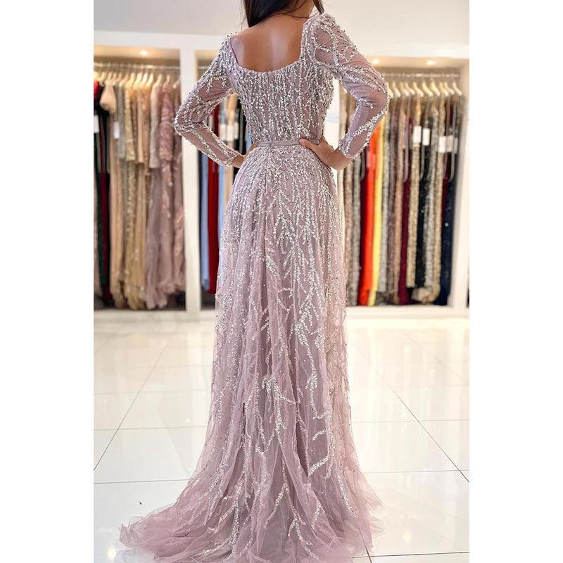 Robe de bal de fin d'année élégante, à manches longues, style sirène scintillante et spectaculaire, avec plumes
