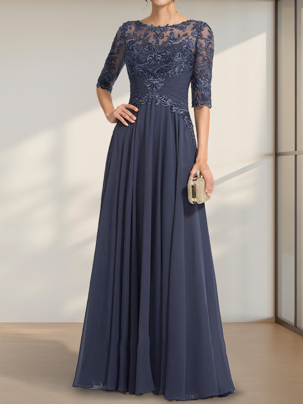 Vestido de novia de corte A, escote ilusión, largo hasta el suelo, de gasa y encaje, con lentejuelas plisadas.
