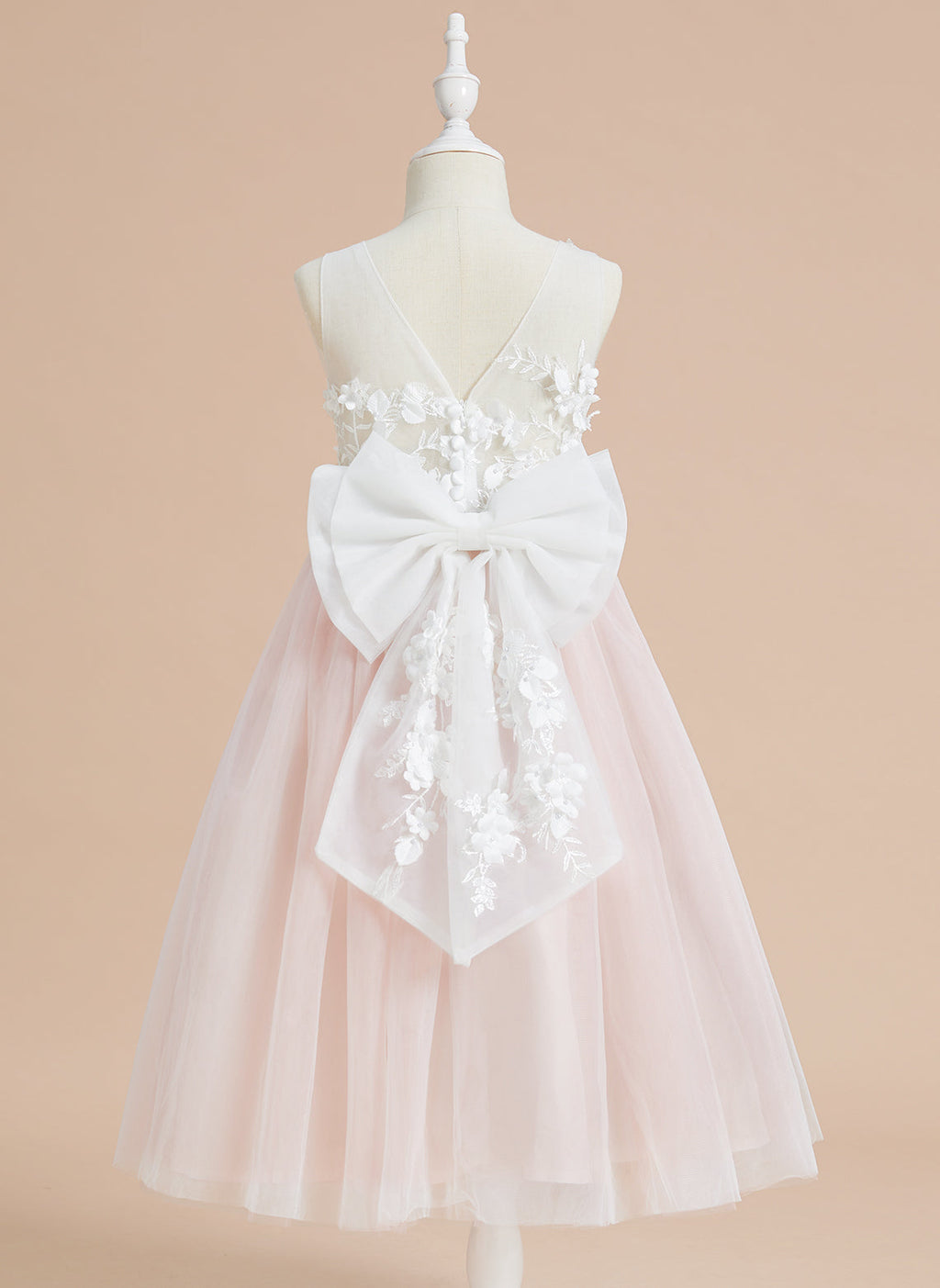 Vestido midi de encaje floral y lazo grande 