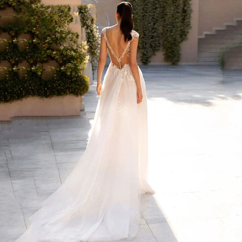 Robes de mariée sexy à décolleté plongeant en V, manches courtes, dos nu, élégantes robes de mariée en tulle et dentelle avec appliques, coupe trapèze 