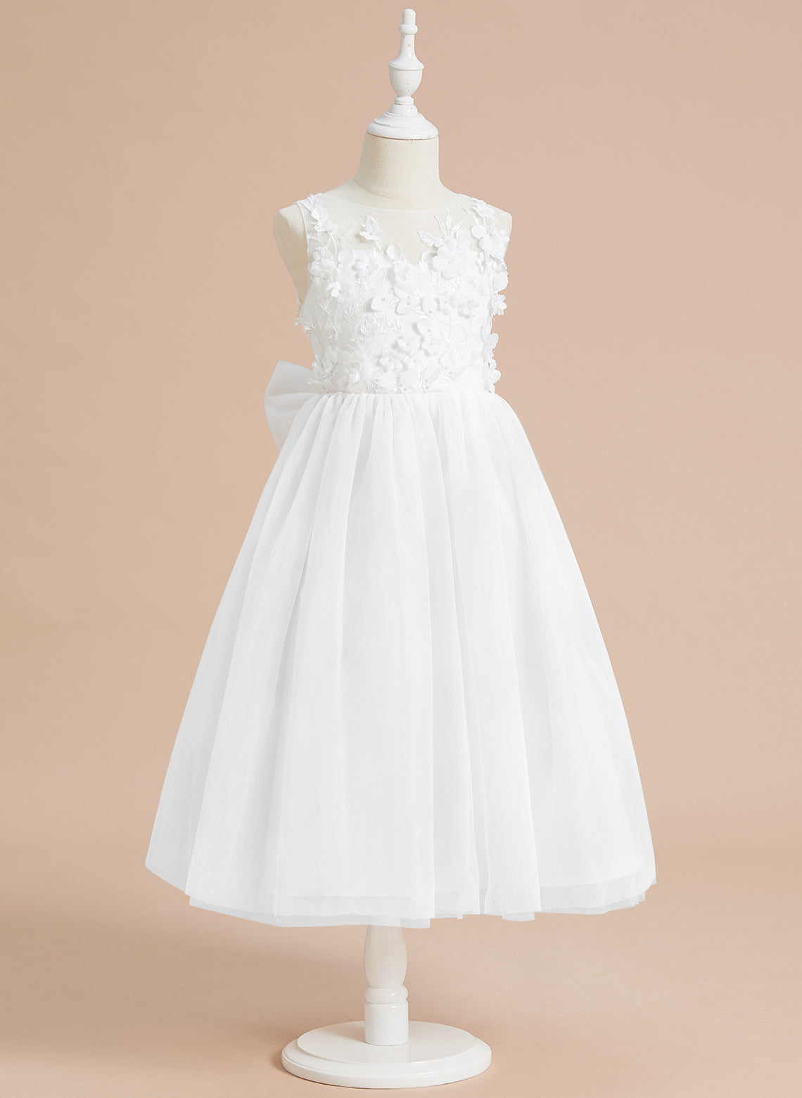 Vestido midi de encaje floral y lazo grande 