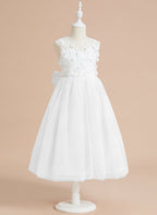 Vestido midi de encaje floral y lazo grande 
