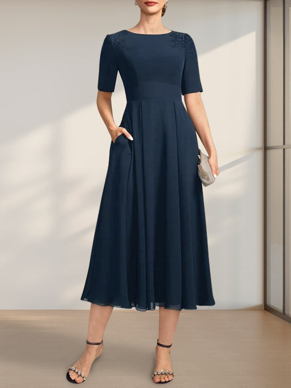 Vestido de corte A, escote redondo, largo té, de gasa, para la madre de la novia, con apliques de encaje y lentejuelas.
