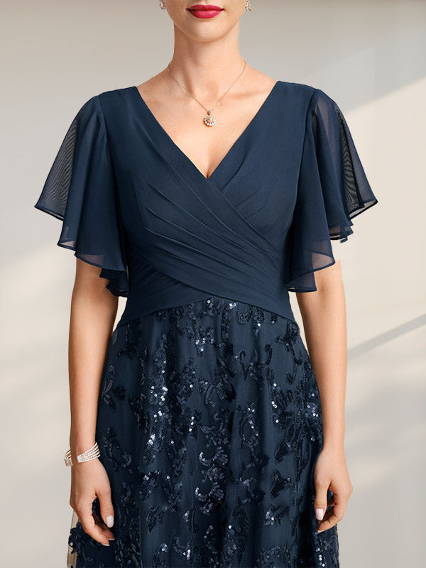 Vestido de novia de corte A, escote en V, largo hasta el suelo, de encaje, lentejuelas y gasa, con pliegues.