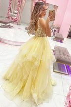 Vestido largo de fiesta amarillo de corte A con escote en V profundo y apliques
