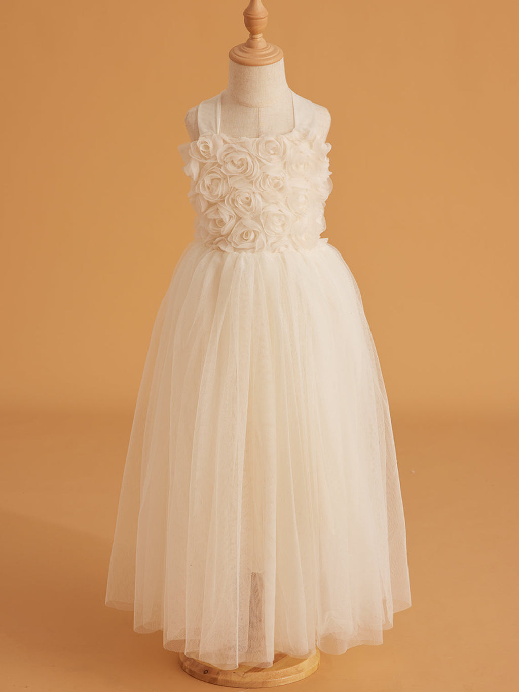 Vestido de bebé niña con lazo de tul y aplique floral en 3D de la colección Jardín Encantado 