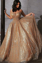 Robe de bal longue glamour dorée en tulle à sequins et volants, coupe trapèze