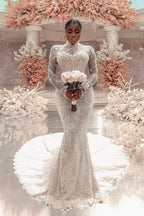 Impresionante vestido de novia largo blanco de encaje columna, cuello alto, manga larga y apliques con cola