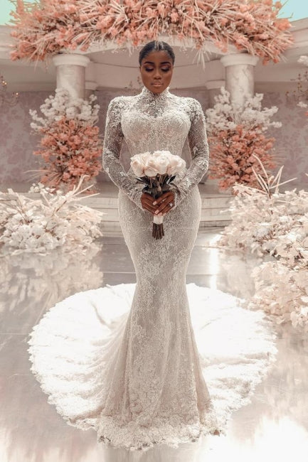Impresionante vestido de novia largo blanco de encaje columna, cuello alto, manga larga y apliques con cola