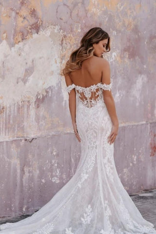 Magnifique robe de mariée blanche sans manches en dentelle colonne avec décolleté cœur et appliques