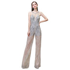 Impresionante mono de fiesta transparente de cuello alto con ilusión óptica, sin mangas, ideal para graduación.