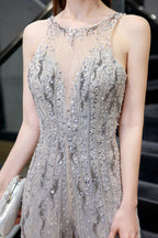 Impresionante mono de fiesta transparente de cuello alto con ilusión óptica, sin mangas, ideal para graduación.
