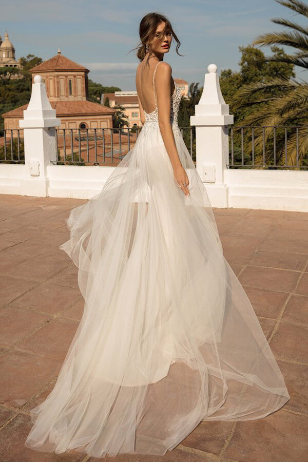 Impresionante vestido de novia largo de sirena con cola de capilla, tul y espalda descubierta