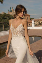 Impresionante vestido de novia largo de sirena con cola de capilla, tul y espalda descubierta